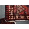 Image 2 : 100% handmade wool carpet runner Sarab with multiple medallions, red background and highlights of bl
