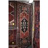 Image 1 : 100% handmade wool carpet runner with center medallion and red background, highlights of blues, crea