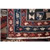 Image 2 : 100% handmade wool carpet runner with center medallion and red background, highlights of blues, crea