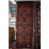 Image 1 : 100% handmade wool carpet runner Savah with triple medallion, red background and highlights of cream