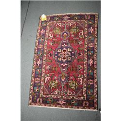 100% handmade Tabriz throw rug with pink background, center medallion and highlights of green, sage,