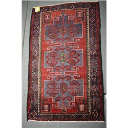 100% handmade wool Zanjan throw rug with triple medallion, red background, highlights of blue, tan, 