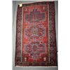 Image 1 : 100% handmade wool Zanjan throw rug with triple medallion, red background, highlights of blue, tan, 