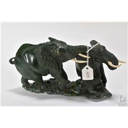 Veridite stone carving of two elephants signed by artist R. Jobarama 9 1/2" in length
