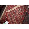 Image 3 : 100% handmade wool scatter rug with red background and fringing 18" X 38"