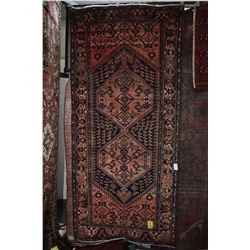 100% handmade wool carpet with double medallion and red background, highlights of blues, brown etc. 