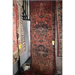 100% handmade wool carpet runner Hamdan with double medallion, red background and highlights of blue