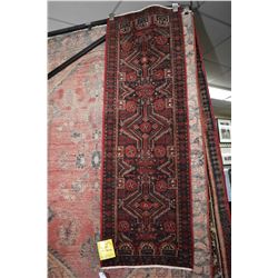 100% handmade wool carpet Baluchi runner with triple medallion and highlights of red, blue, cream et