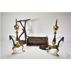 Pair of brass andirons, mounted shoe last, a sadiron and a foot warmer