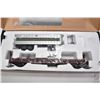Image 2 : Three new in box O gauge train cars including two M.T.H Rail King; Pacific Great Eastern dump car wi