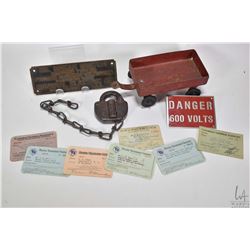 Selection of collectibles including brass plaque labelled "Oil Break Switch", metal plaque "Danger 6