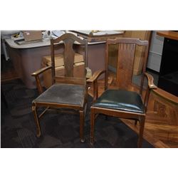 Two non-matching open arm dining chairs