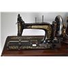 Image 2 : Highly decorative Bradbury's Family hand crank portable sewing machine with lid and original key
