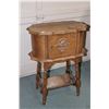 Image 2 : Small smoker's cabinet with single door with attached carving and book storage in trestle base plus 