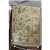 Image 1 : Vintage wool area carpet with geometric floral design in soft sage colour with highlights of brown, 
