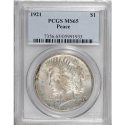 1921 S$1 MS65 PCGS. This lovely representative derives