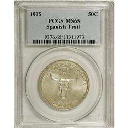 1935 50C Spanish Trail MS65 PCGS. Delicate gold and la