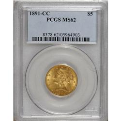 1891-CC $5 MS62 PCGS. Soft luster emanates from honey-