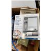 Image 2 : Box of shower items and water filter with halogen lights