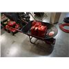 Image 1 : Metal wheelbarrow and jerry cans