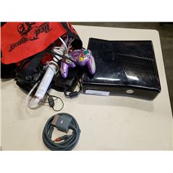 Xbox 360 console with controller, gamecube controller and hair style wand