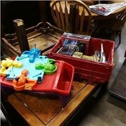 Tote of star wars toys may be missing parts with hungry hungry hippos game and eating trays