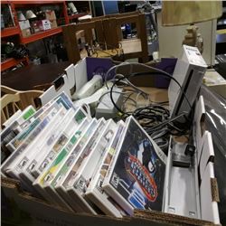 Nintendo Wii console with cords, games and controllers