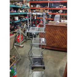 Motorized dancing 5 tier display shelf