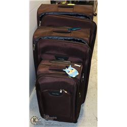 CALVIN KLEIN SET OF TWO BROWN LUGGAGE BAGS