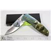 Image 1 : FOLDING KNIFE WITH BELT CLIP AND GRIZZLY BEAR