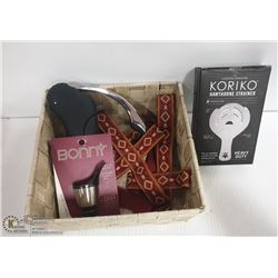 A BASKET OF WINE ACCESSORIES