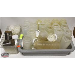 BUS BIN OF ASSORTED CONDIMENT SQUEEZE BOTTLES W/
