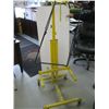 Image 1 : ADJUSTABLE YELLOW STAND ON CASTERS