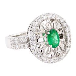 1.16 ctw Oval Mixed Emerald And Round Brilliant Cut Diamond Ring - 14KT White Go