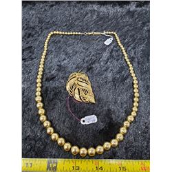 Napier gold tone metal bead necklace and broach
