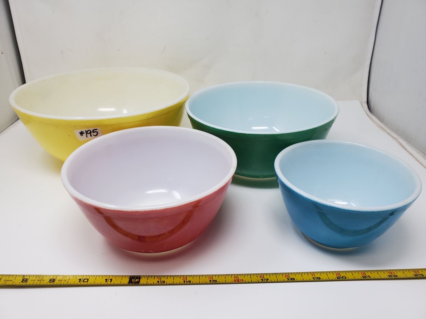 195. Pyrex, primary set, yellow, green, red and blue bowls