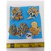 Image 1 : 200. Lot of gold tone and yellow rhinestone broaches, (4)
