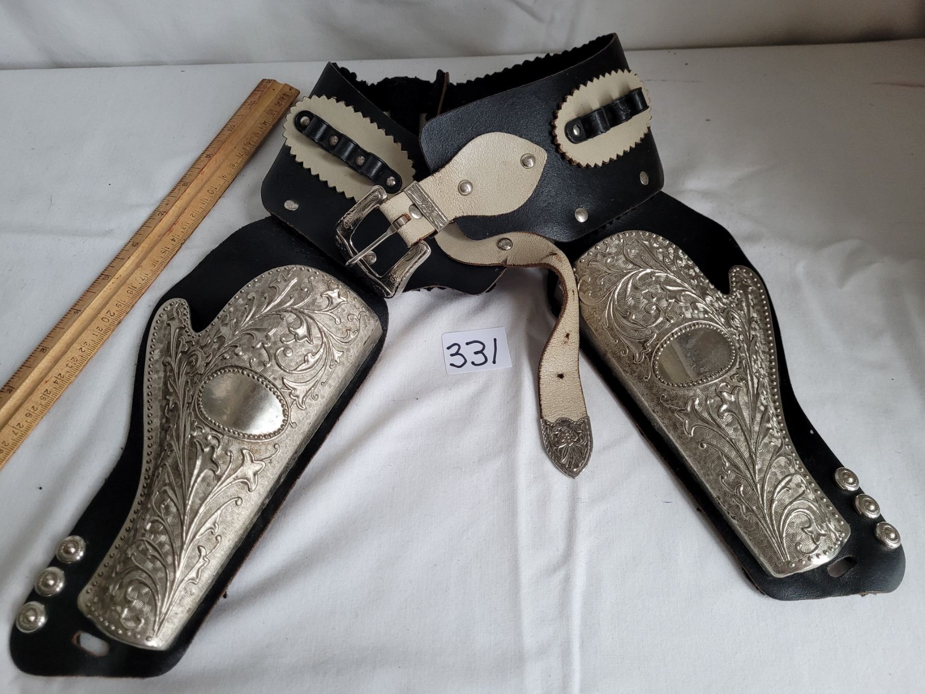 Nice Vintage toy gun holster. Leather belt, riveted with heavy ornate