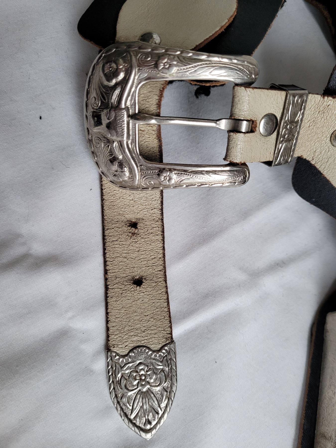 Nice Vintage toy gun holster. Leather belt, riveted with heavy ornate