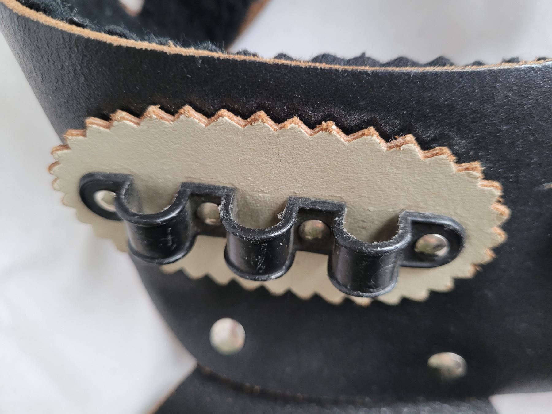 Nice Vintage toy gun holster. Leather belt, riveted with heavy ornate