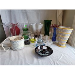 Assortment of vases and candle holders.