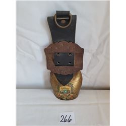 Vintage German cow bell. Metal buckle & leather strap.