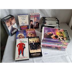 Group of various VHS movies including Disney.