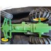 Image 3 : John Deere tractor with steerable rubber wheels.