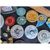 Image 5 : Jar of metal pins, golf ball markers and pin on festival buttons.