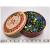 Image 1 : tin full of marbles