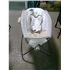 Image 1 : baby chair (fisher price) folds up for storage