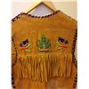 Image 6 : 216.  Fringed beaded vest, some damage and fading