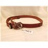 Image 1 : 217.  Tooled leather belt with sterling chased buckle, note extensions