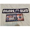 Image 1 : Oilers tin sign 24" X 5" and Oilers clock 14" X 6"